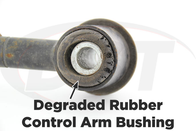degraded rubber control arm bushing