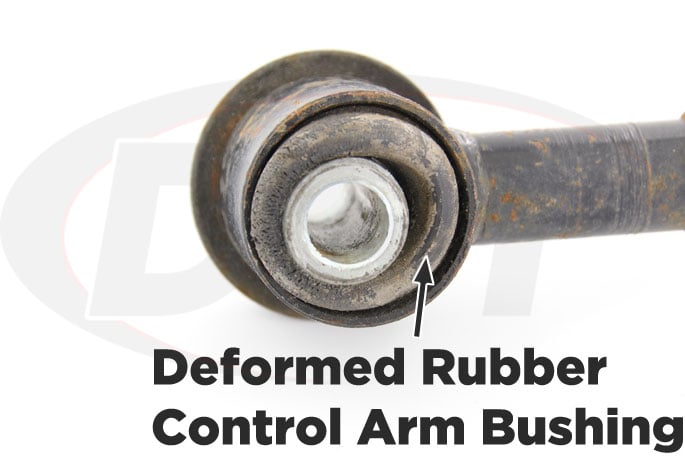 deformed rubber rear control arm bushing
